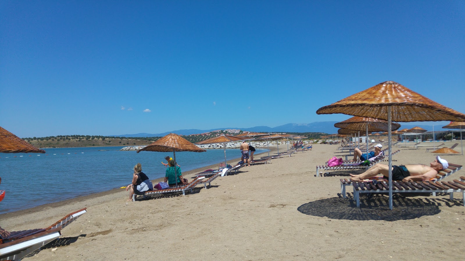 Foto di Ayla Hanim beach con una superficie del sabbia beige