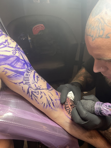 Explore 2 dog tattoo ideas, creative tattoo ideas in Peoria, available at Modern Ink Tattoo