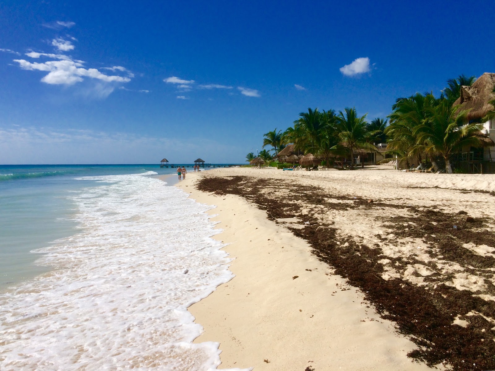 Foto af Playa Xcalacoco med lys fint sand overflade