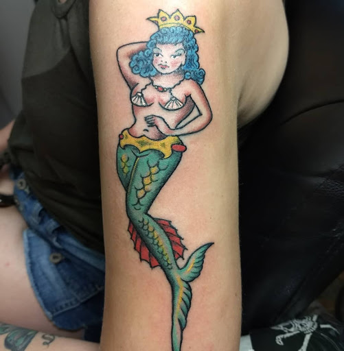 Explore book dragon tattoo ideas, creative tattoo ideas in Coeur D Alene, available at Northwest Tattoo Museum & Tattooing