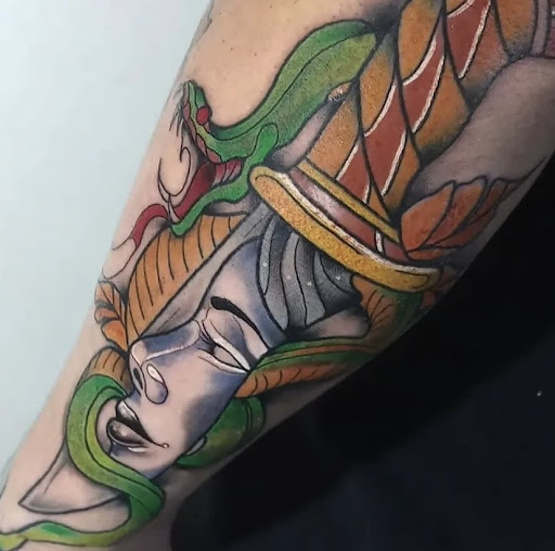 Explore bite mark tattoo ideas, creative tattoo ideas in Woodhaven, available at 94 Ink Tattoos