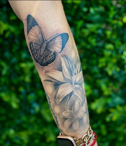 Explore half leg sleeve tattoo ideas, creative tattoo ideas in San Diego, available at Hustle Tattoo & Piercing Studio