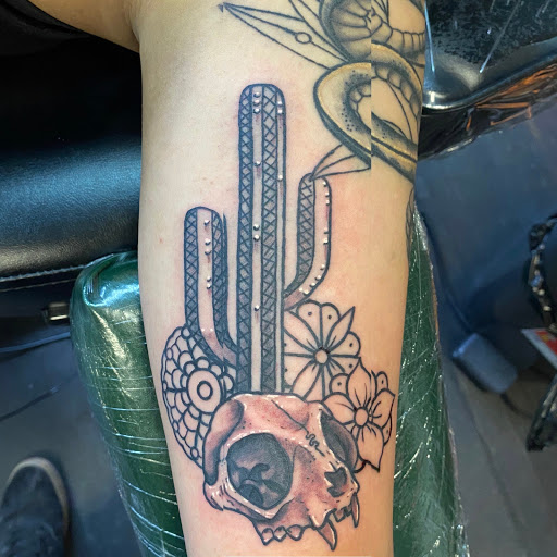 Find halloween tattoo ideas for your next unique tattoo in Logan at Surreal Ink Tattoo & Body Piercing