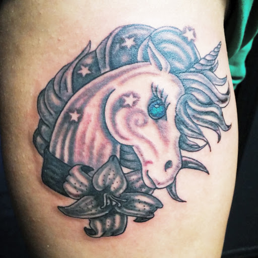 Explore pec tattoo ideas, creative tattoo ideas in Erie, available at EliKingInk