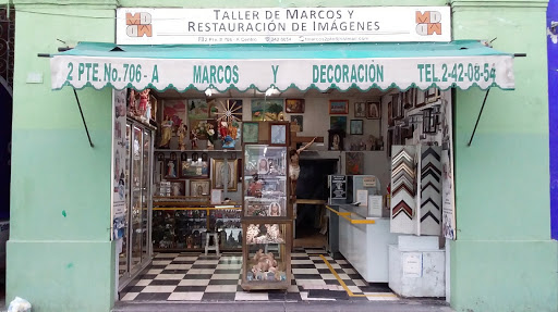 TALLER DE MARCOS Y RESTAURACION DE IMAGENES