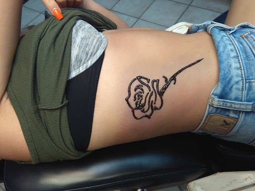 Explore tattoo ideas for back of the neck, creative tattoo ideas in Bradenton, available at Memory Lane Tattoo Co.