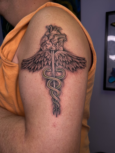 Explore male thigh tattoo ideas, creative tattoo ideas in Red Bank, available at Resilient Visions