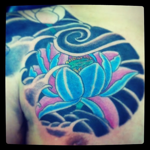 Explore ladies back tattoo ideas, creative tattoo ideas in Miami, available at Tattoos by Lou Miami - North Miami