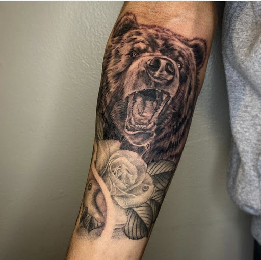 Explore dead dog tattoo ideas, creative tattoo ideas in Amherst, available at Wanderlust Tattoo & Piercing