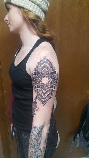 Explore good shoulder tattoo ideas, creative tattoo ideas in Spencer, available at Ink Envy Tattoo And Body Piercing