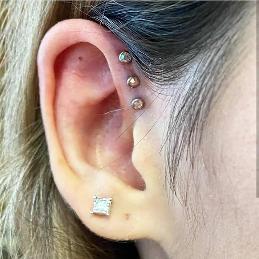 Explore non binary tattoo ideas, creative tattoo ideas in Summerville, available at Exotic Impressions Body Piercing