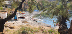Photo de Platja Cala de la Creu entouré de montagnes