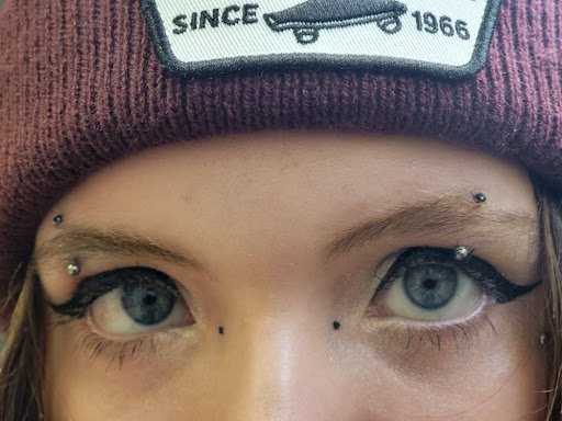 Explore small medusa tattoo ideas, creative tattoo ideas in Washington, available at Trilogy Atelier - DC Tattoo Shop Piercing Studio