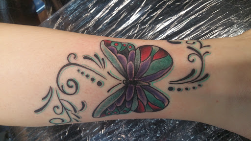 Explore lost time tattoo ideas, creative tattoo ideas in Bakersfield, available at Naked Als Tattoos & Piercing