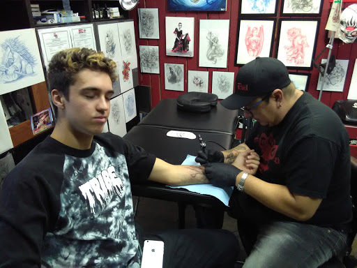 Explore beach tattoo ideas for men, creative tattoo ideas in Albuquerque, available at Evil Emporium of Tattoos