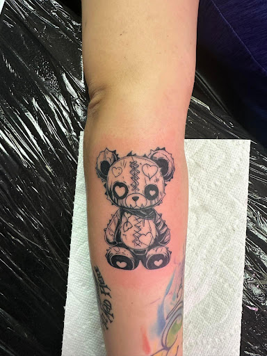 Explore lower tummy tattoo ideas, creative tattoo ideas in Fort Myers, available at Loyal 2 The Coil Tattoos & Piercings (Edison Mall Location Entrance F)