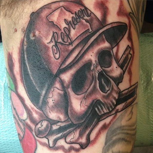 Explore back of the thigh tattoo ideas, creative tattoo ideas in Kansas City, available at Golden Stag Tattoo and Gallery