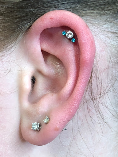 Explore small rose tattoo ideas, creative tattoo ideas in Mount Juliet, available at Division Street Tattoo Company