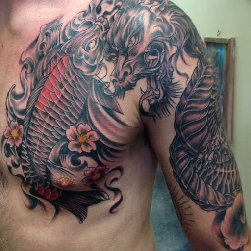 Tattoo Shop «Moth Studio», reviews and photos, 428 W Commercial St, Springfield, MO 65803, USA