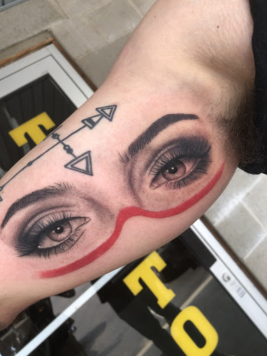 Explore small back tattoo ideas, creative tattoo ideas in Middletown, available at Traditionally Twisted Tattoo