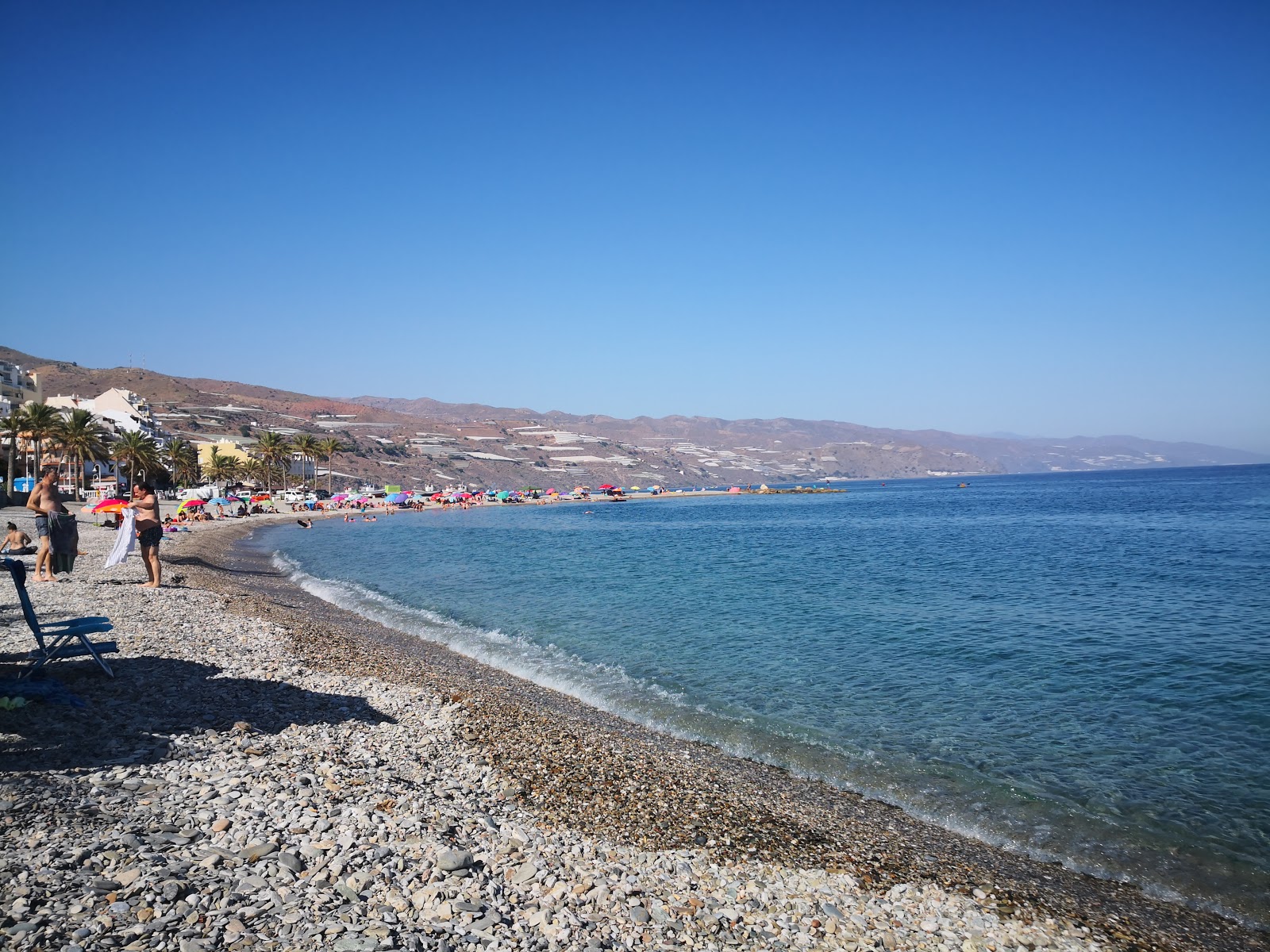 Foto von Playa Castell del Ferro mit viele lange buchten
