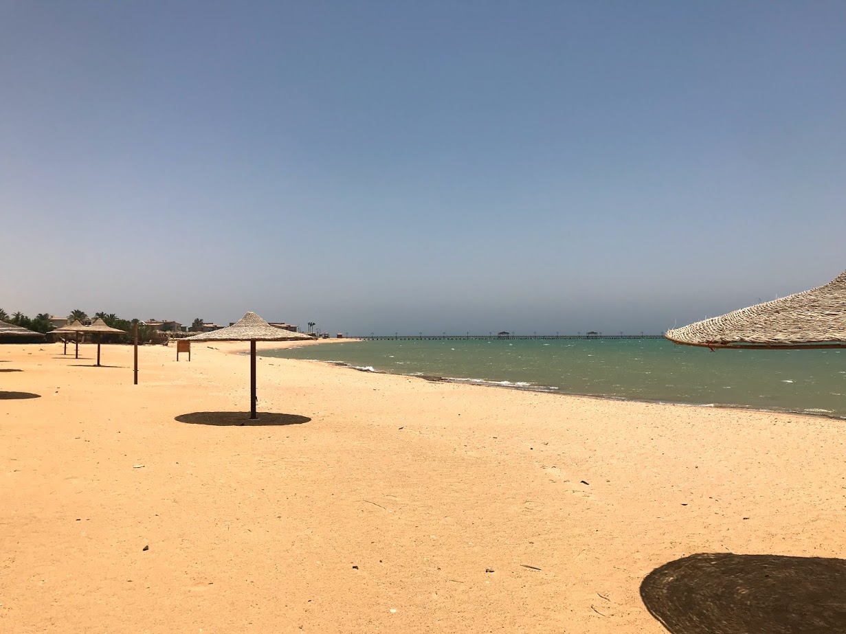 Foto van Coral Sea beach met helder zand oppervlakte