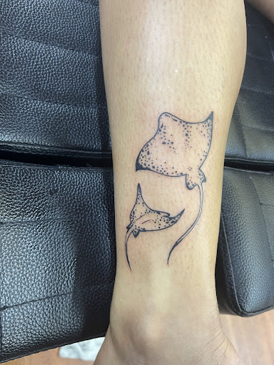 Explore blackwork tattoo ideas, creative tattoo ideas in Cocoa, available at Rorschach Tattoo Shop and Piercing Studio