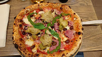 Pizza du Restaurant italien 𝐂𝐀𝐑𝐈𝐒𝐌𝐀 • 𝐏𝐢𝐳𝐳𝐞𝐫𝐢𝐚 & 𝐂𝐮𝐜𝐢𝐧𝐚 𝐈𝐭𝐚𝐥𝐢𝐚𝐧𝐚 • à Les Pavillons-sous-Bois - n°20