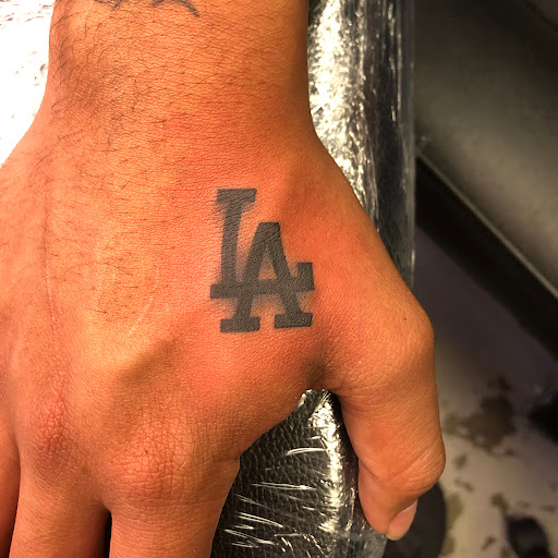 Explore head tattoo ideas for guys, creative tattoo ideas in Dallas, available at M Street Tattoo Studio