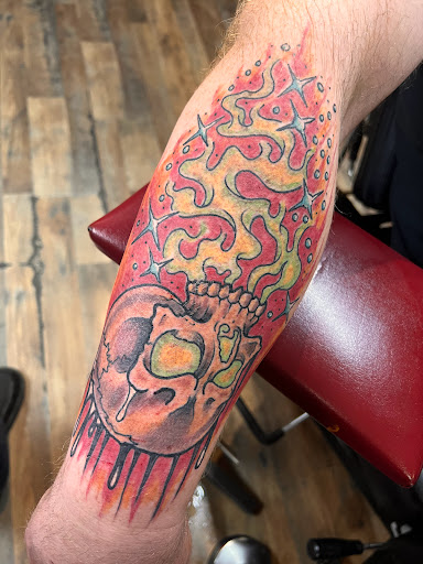 Explore universe tattoo ideas, creative tattoo ideas in Pikeville, available at The Carbon Canary Tattoo Studio