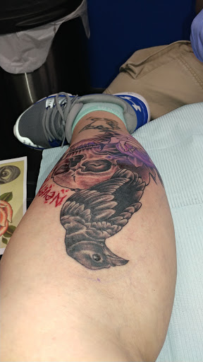 Explore cancer ribbon tattoo ideas, creative tattoo ideas in Carlisle, available at Visual Addiction Tattoos