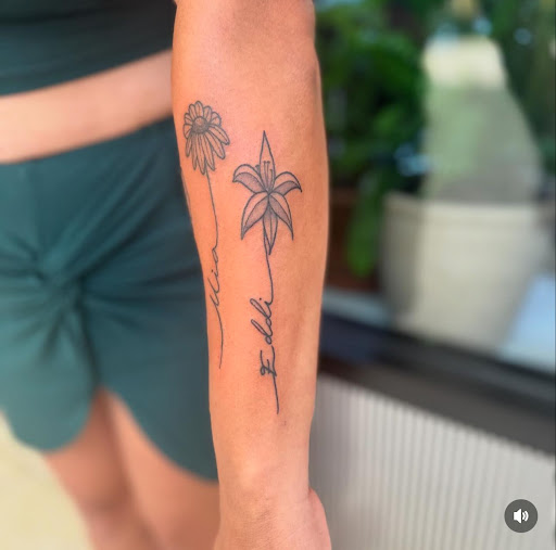 Explore skull hand tattoo ideas, creative tattoo ideas in Fort Myers, available at Loyal 2 The Coil Tattoos & Piercings (Edison Mall Location Entrance F)