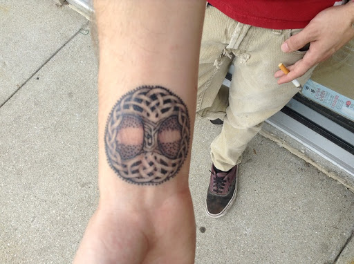 Find best couple tattoo ideas for your next unique tattoo in Seymour at American Gypsy Tattoo Corp.