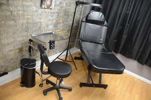 Explore upper arm tattoo ideas, creative tattoo ideas in Dixon, available at Raven Tattoo