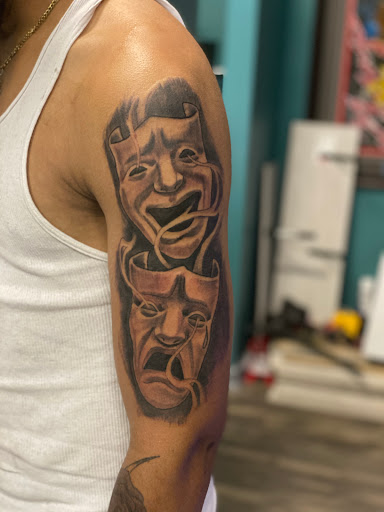 Explore upper arm men tattoo ideas, creative tattoo ideas in Goose Creek, available at Red Kirin Tattoo