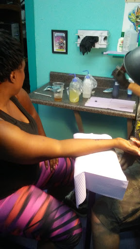 Explore wine tattoo ideas, creative tattoo ideas in Lima, available at White Wizard Tattoo & Body Piercing