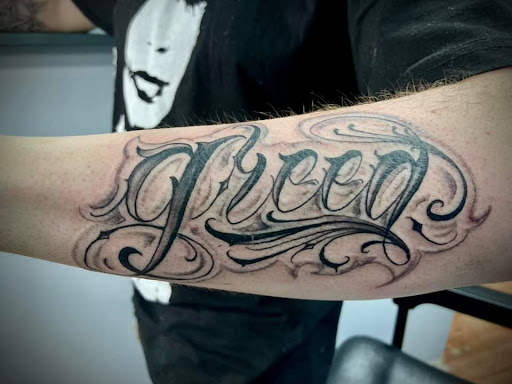 Explore number 5 tattoo ideas, creative tattoo ideas in Hudson, available at Twisted Canvas Tattoo and Art Studio