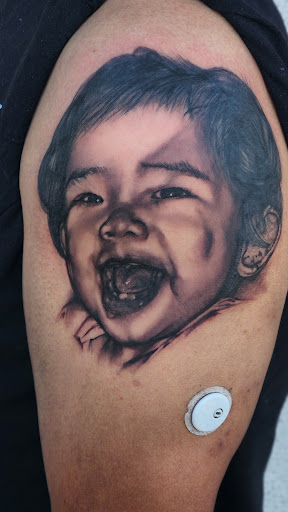 Explore mother tattoo ideas for men, creative tattoo ideas in San Diego, available at Bay Ink Tattoo & Piercing