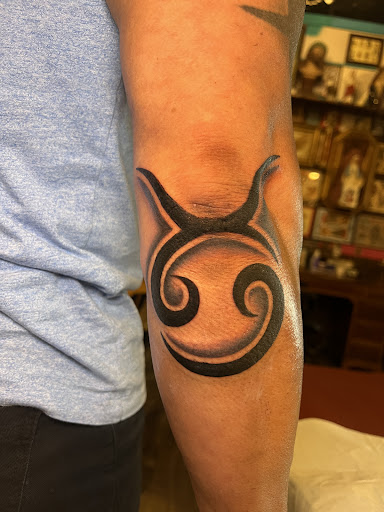 Explore tricep tattoo ideas, creative tattoo ideas in Fort Lauderdale, available at Electric Street Tattoo