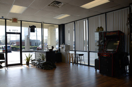 Tattoo Shop «Tattoo Machine Gun- Clark», reviews and photos, 1705 Charlestown New Albany Rd a, Jeffersonville, IN 47130, USA