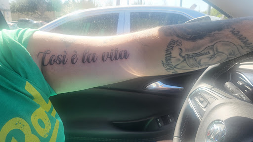 Explore women's hand tattoo ideas, creative tattoo ideas in Davenport, available at Fine Ink Studios Tattoos