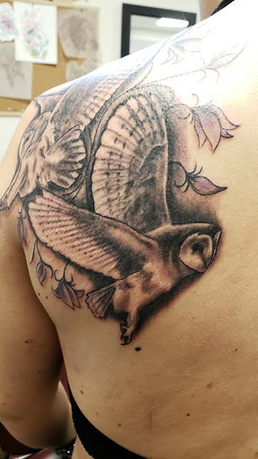 Find sunflower tattoo ideas for females for your next unique tattoo in Flint at Black Eye Social Club Tattoo