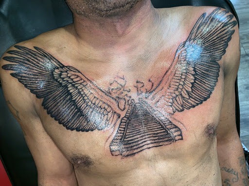 Explore safety pin tattoo ideas, creative tattoo ideas in Lexington, available at LexInk Tattoo