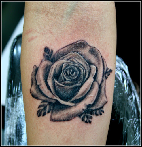 Explore black heart heart tattoo cover up ideas, creative tattoo ideas in Fort Myers, available at Tiger Lotus Tattoo and Piercing