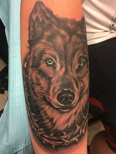 Explore dachshund tattoo ideas, creative tattoo ideas in Fargo, available at Golden Dragon Tattoo