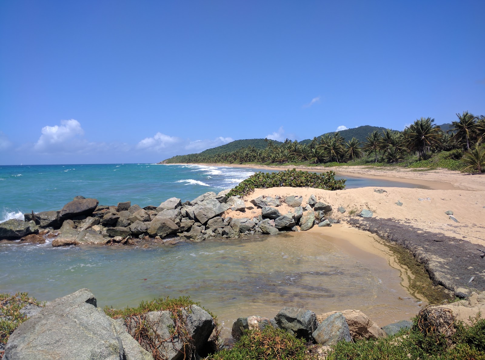 Foto von Playa Grande mit beiger sand Oberfläche