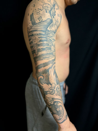 Explore neck tattoo ideas for females, creative tattoo ideas in Grovetown, available at Triumph Tattoo Company