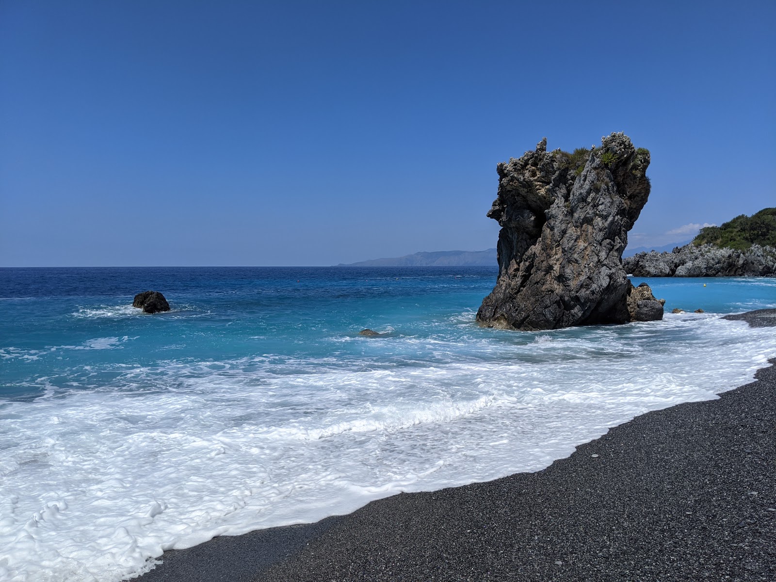 Spiaggia di Santa Teresa的照片 带有蓝色的水表面