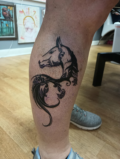 Explore jimmy buffett tattoo ideas, creative tattoo ideas in Elizabethtown, available at Electric Feel Tattoos