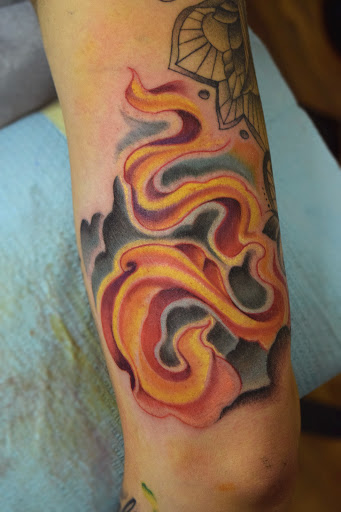 Explore gun tattoo ideas for men, creative tattoo ideas in Scottsbluff, available at Elixir Tattoo